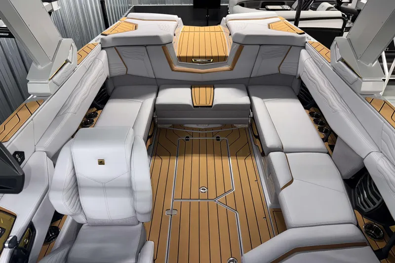Slide: The Image of Luxurious interior of 2026 Nautique Super Air Nautique G23 boat with elegant seating. - 24