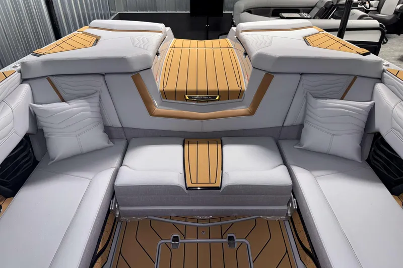 Slide: The Image of 2026 Nautique Super Air Nautique G23 interior with luxurious seating and modern design. - 25
