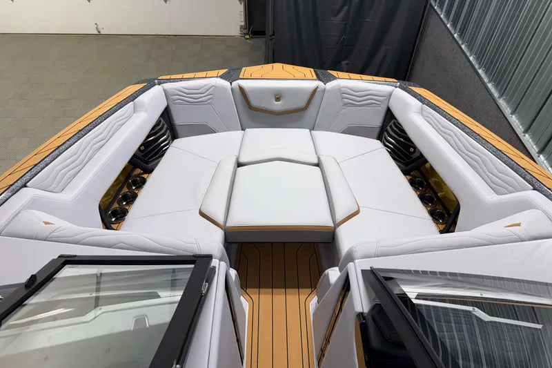 Slide: The Image of 2026 Nautique Super Air Nautique G23 boat interior with luxurious seating and modern design. - 28