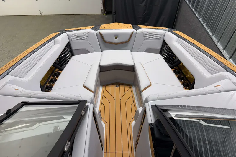 Slide: The Image of 2026 Nautique Super Air Nautique G23 interior with luxurious seating and sleek design. - 30