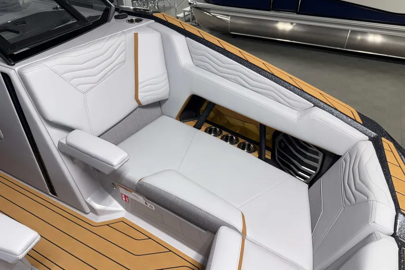 Slide: The Image of 2026 Nautique Super Air Nautique G23 interior with luxurious seating and modern design. - 32