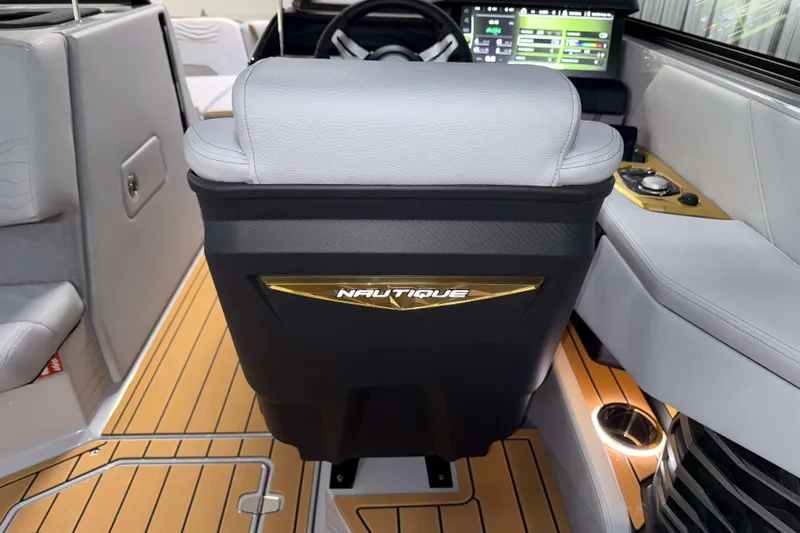 Slide: The Image of 2026 Nautique Super Air Nautique G23 interior with modern dashboard and luxurious seating. - 38