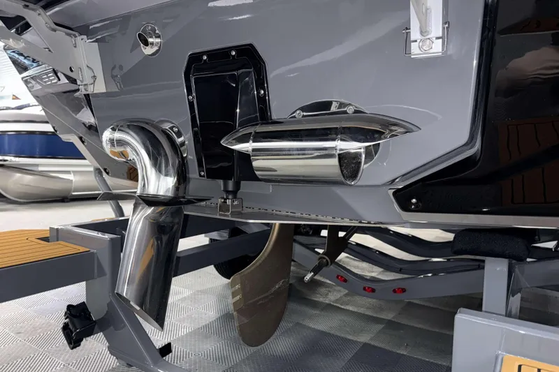 Slide: The Image of 2026 Nautique Super Air Nautique G23 boat exhaust and propeller detail. - 54