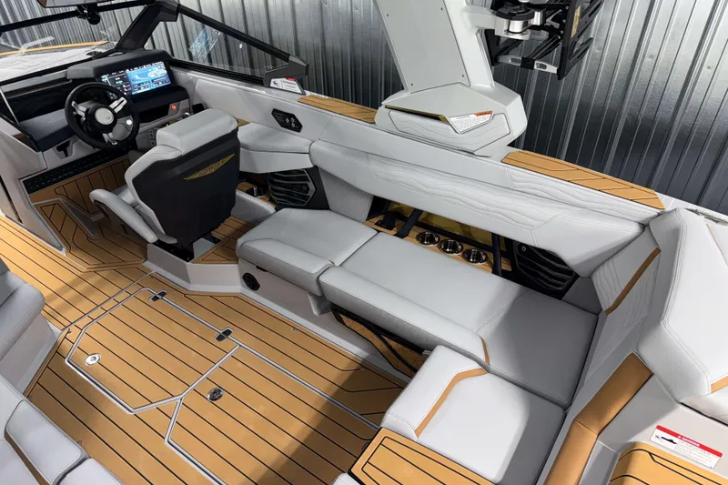 Slide: The Image of 2026 Nautique Super Air Nautique G23 interior with sleek design and advanced dashboard. - 7