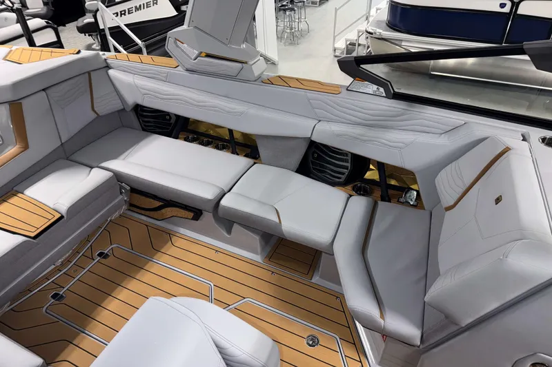 Slide: The Image of 2026 Nautique Super Air Nautique G23 interior with luxurious seating and modern design. - 8