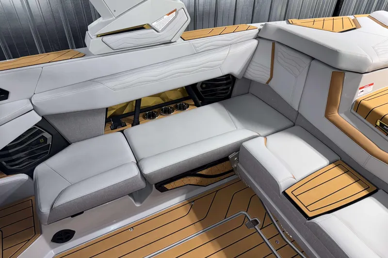 Slide: The Image of 2026 Nautique Super Air Nautique G23 interior with luxurious seating and modern design. - 9
