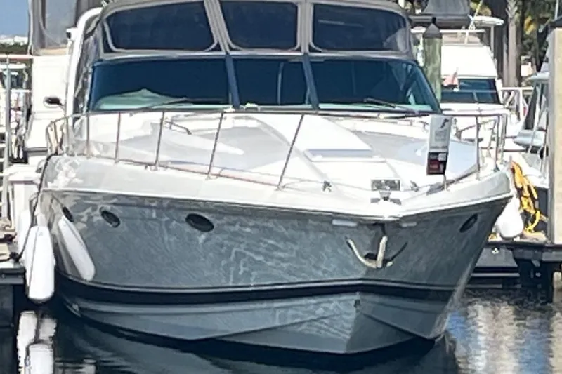 The Image of 2002 Formula 41 Performance Cruiser docked at marina, front view. - 0