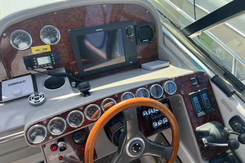 Slide: The Image of Control panel of a 2002 Formula 41 Performance Cruiser with navigation equipment. - 6