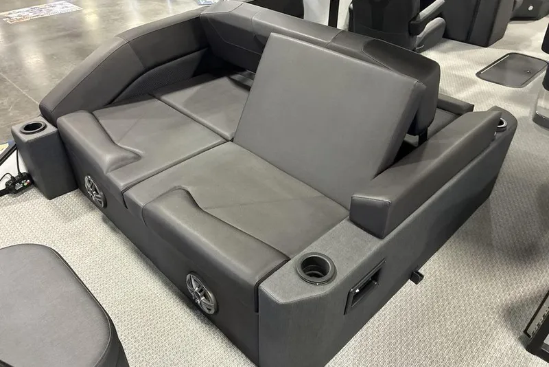 Slide: The Image of Gray Evotti 523CS boat seating with cup holders and speakers, 2026 model. - 3