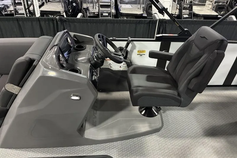 Slide: The Image of 2026 Evotti 523CS boat interior with sleek helm and comfortable captain's chair. - 7