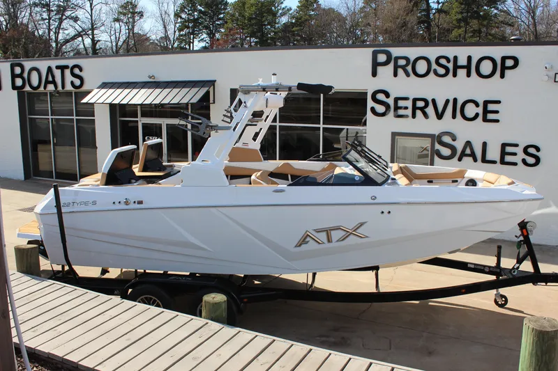 The Image of 2026 ATX Surf Boats 22 Type-S displayed at a pro shop service and sales center. - 0