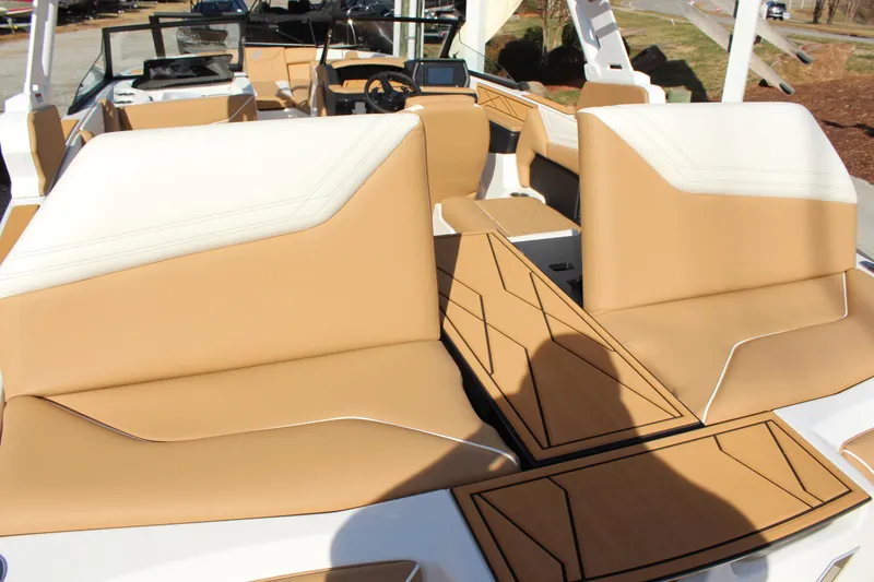 Slide: The Image of 2026 ATX Surf Boats 22 Type-S interior with tan and white seating, modern design. - 12