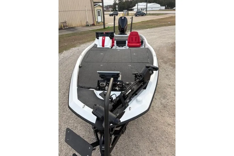 Slide: The Image of 2024 iKon LX21 boat with red seats and advanced fishing equipment. - 7