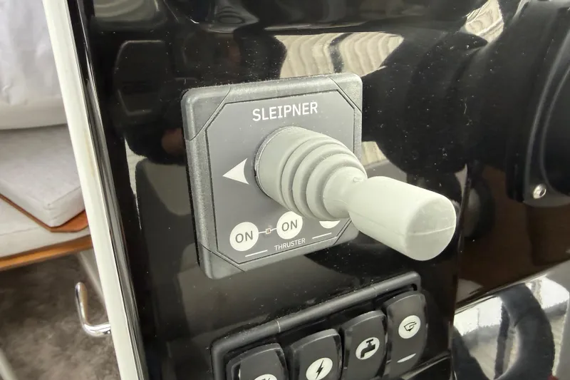 Slide: The Image of Joystick control panel on 2024 Jeanneau NC 695 Sport boat. - 14