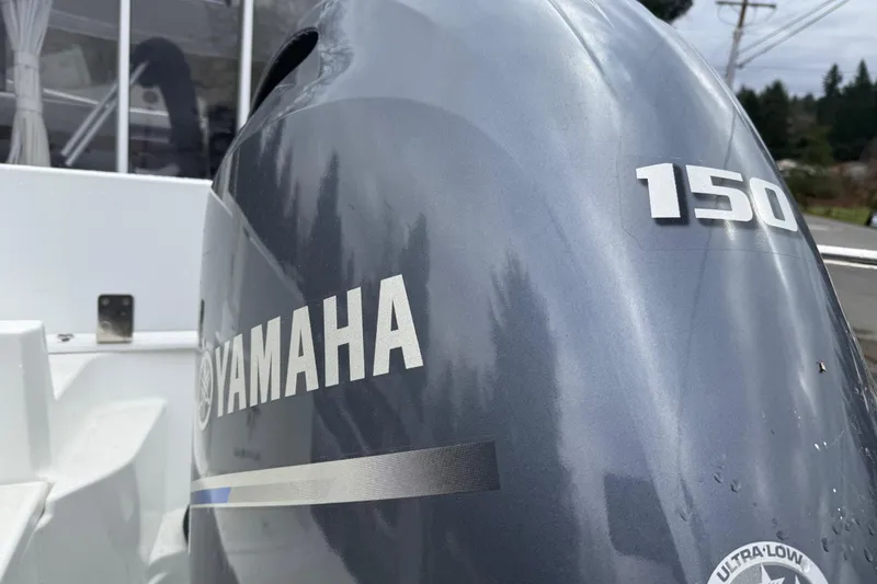 Slide: The Image of Yamaha 150 outboard motor on 2024 Jeanneau NC 695 Sport boat. - 37