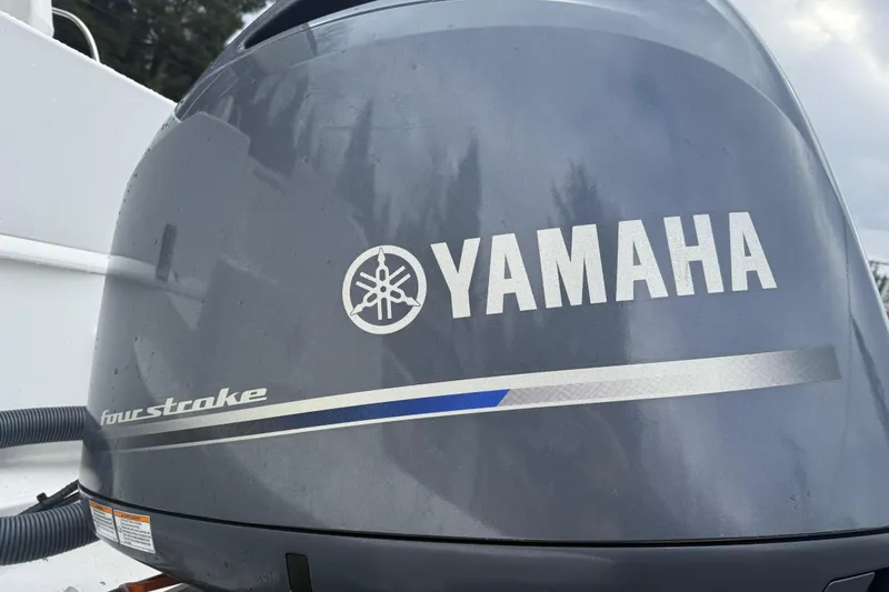 Slide: The Image of Yamaha four-stroke engine on 2024 Jeanneau NC 695 Sport boat. - 38