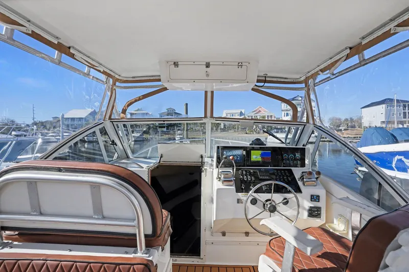 Slide: The Image of Interior view of a 2002 Albemarle 28 Express boat in harbor. - 8