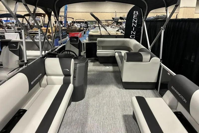 Slide: The Image of 2025 Bennington S L-Bench 20 SL pontoon boat interior at a boat show. - 3