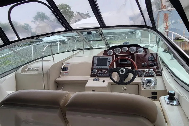 Slide: The Image of 2008 Sea Ray Sundancer 330 helm with modern controls and navigation equipment. - 5