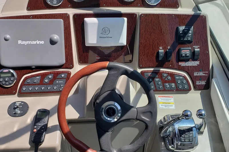 Slide: The Image of 2008 Sea Ray Sundancer 330 helm with Raymarine electronics and VesselView display. - 6