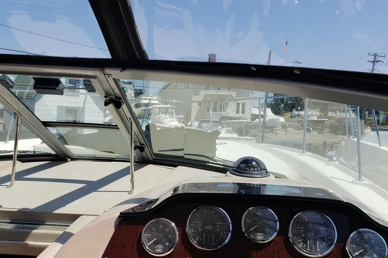 Slide: The Image of Interior view of 2008 Sea Ray Sundancer 330 boat dashboard with gauges and compass. - 7