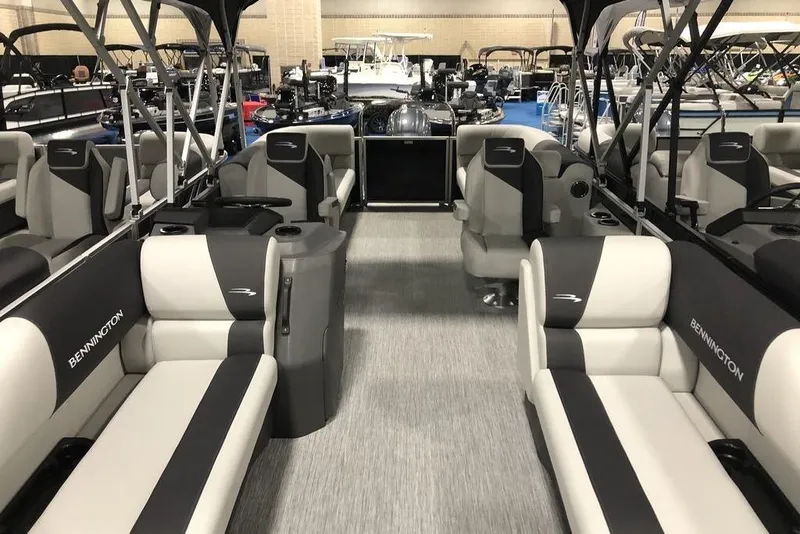 Slide: The Image of 2026 Bennington S Quad Bench 22 SSR SPS interior with luxurious seating and modern design. - 4