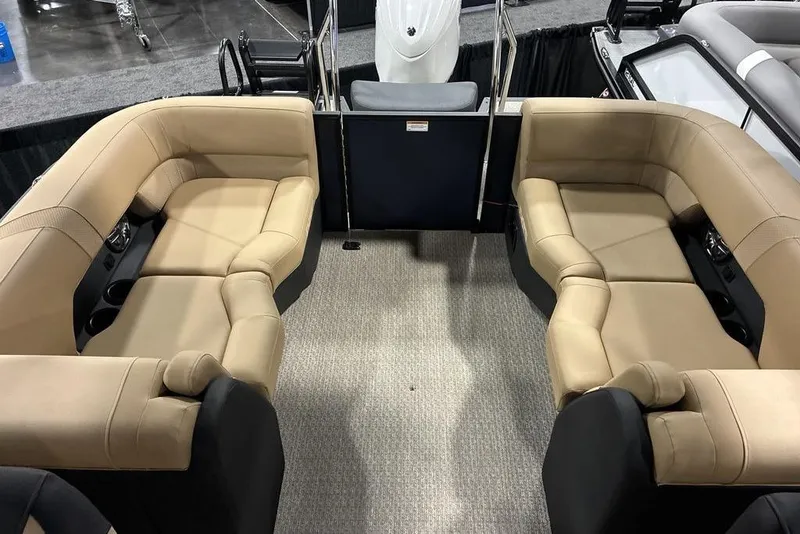 Slide: The Image of Luxurious seating area on 2026 Evotti 521QL boat with beige upholstery. - 2
