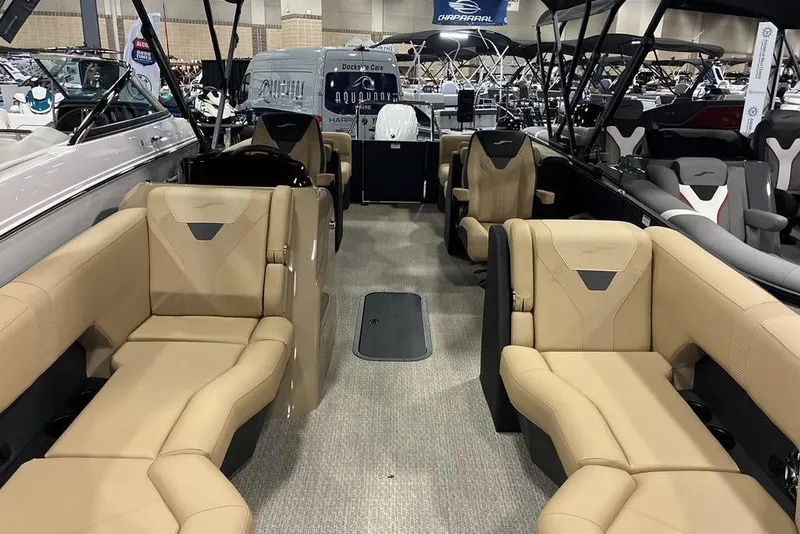Slide: The Image of Luxurious interior of 2026 Evotti 521QL boat with beige seating at a boat show. - 4