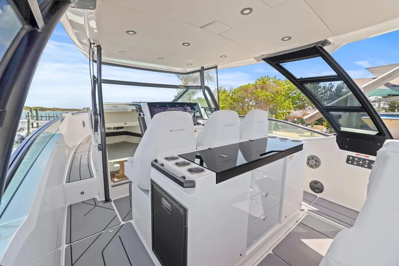 Slide: The Image of Luxurious interior of 2025 Saxdor 320 GTO boat with modern seating and sleek design. - 12