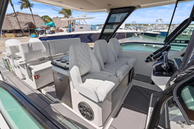 Slide: The Image of Luxurious interior of 2025 Saxdor 320 GTO yacht with plush seating and modern helm. - 18