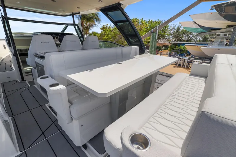 Slide: The Image of 2025 Saxdor 320 GTO boat interior with sleek seating and modern design. - 21