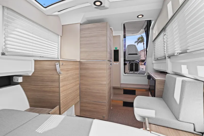 Slide: The Image of Interior of 2025 Saxdor 320 GTO boat, featuring modern design and comfortable seating. - 32