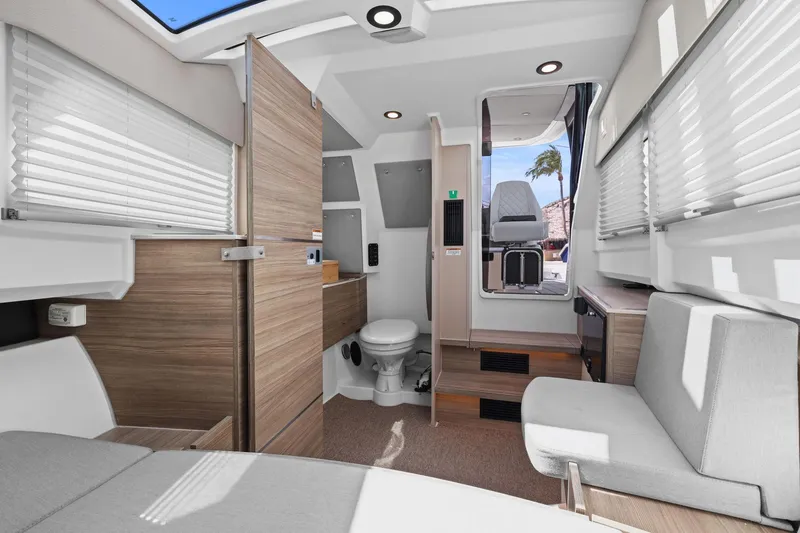 Slide: The Image of Interior of 2025 Saxdor 320 GTO boat, featuring modern design and comfortable seating. - 33