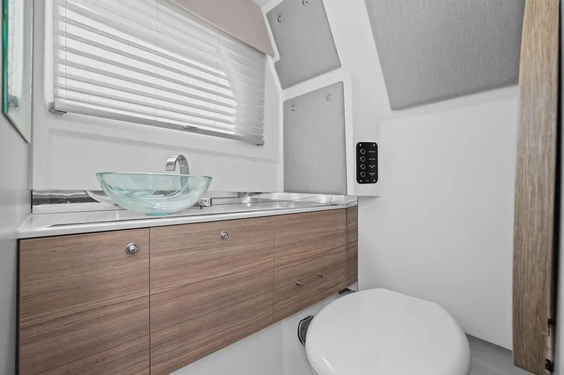 Slide: The Image of Modern bathroom interior of 2025 Saxdor 320 GTO with glass sink and wooden cabinetry. - 35
