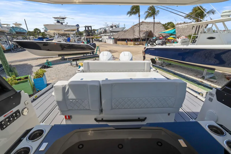 Slide: The Image of 2025 Saxdor 320 GTO boat interior at a marina with other boats. - 36