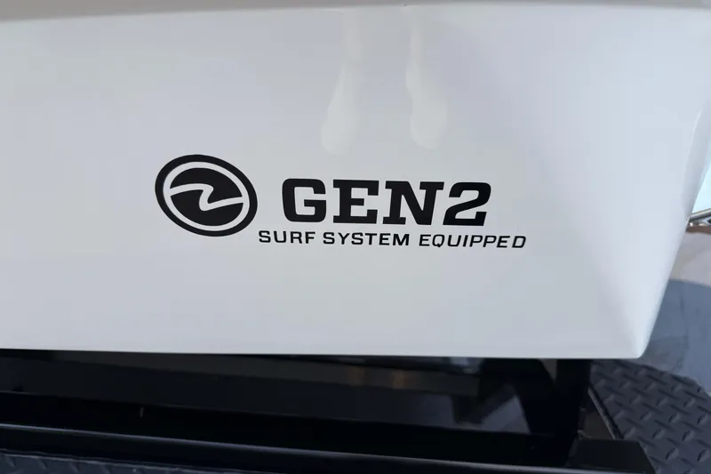 Slide: The Image of 2020 MasterCraft XT23 with GEN2 Surf System Equipped logo on the hull. - 26
