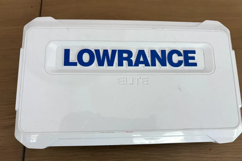 Slide: The Image of Lowrance Elite device on 1994 Hewes Redfisher 18 boat, white casing with blue lettering. - 16