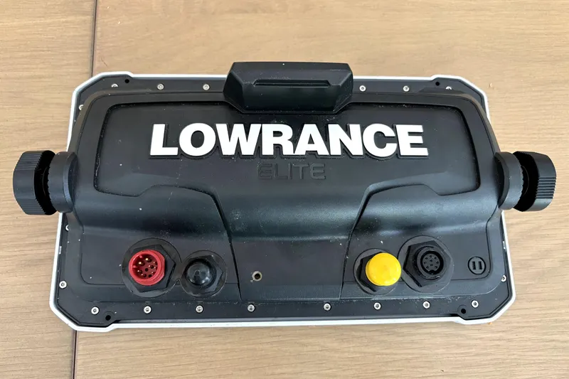 Slide: The Image of Lowrance Elite fishfinder on 1994 Hewes Redfisher 18 boat, showcasing rear connections. - 17