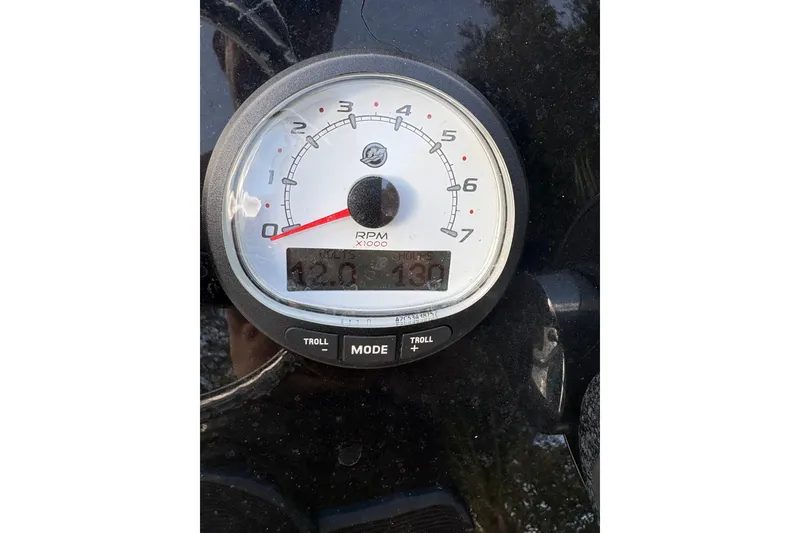 Slide: The Image of Tachometer of 1994 Hewes Redfisher 18 boat showing RPM and hours. - 7