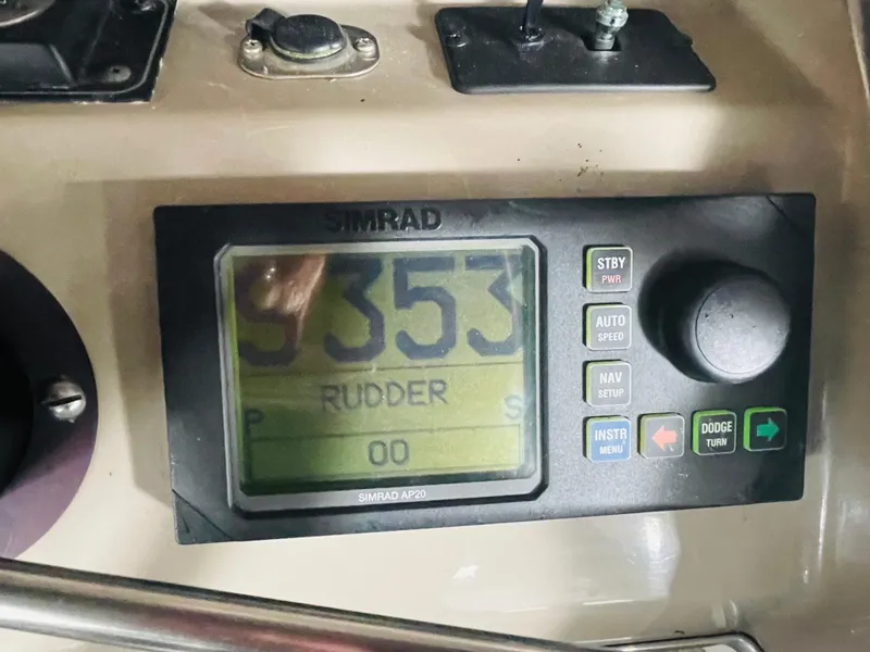 Slide: The Image of Simrad autopilot display on 1995 Bayliner 4587 Motoryacht showing rudder position. - 22