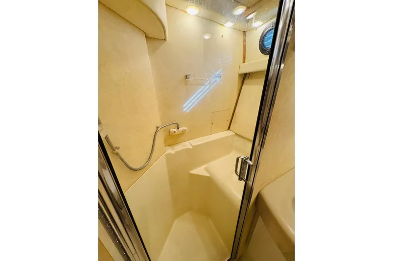 Slide: The Image of Bathroom interior of 1995 Bayliner 4587 Motoryacht with shower and glass door. - 43