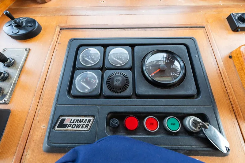 Slide: The Image of Control panel of a 1986 Kadey-Krogen 42 boat with Lehman Power gauges. - 14