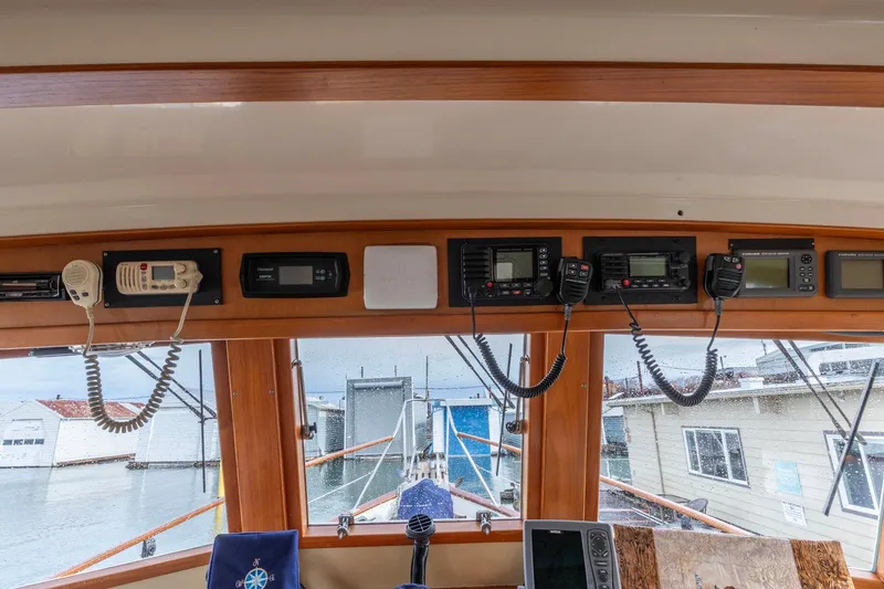 Slide: The Image of Interior view of 1986 Kadey-Krogen 42 boat with navigation equipment and radios. - 17