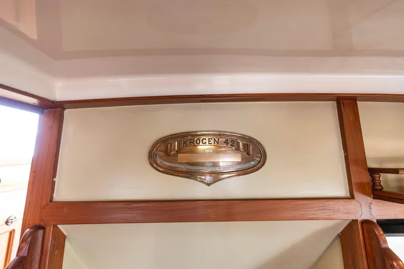 Slide: The Image of Kadey-Krogen 42 yacht interior detail, showcasing a brass nameplate, 1986 model. - 21