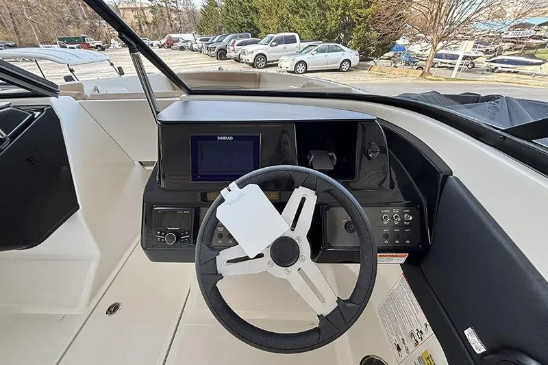 Slide: The Image of 2026 Bayliner V20i boat engine compartment open, showcasing modern engine design. - 10