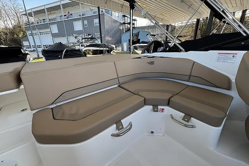 Slide: The Image of 2026 Bayliner V20i boat on trailer, rear view with canopy, outdoors. - 5