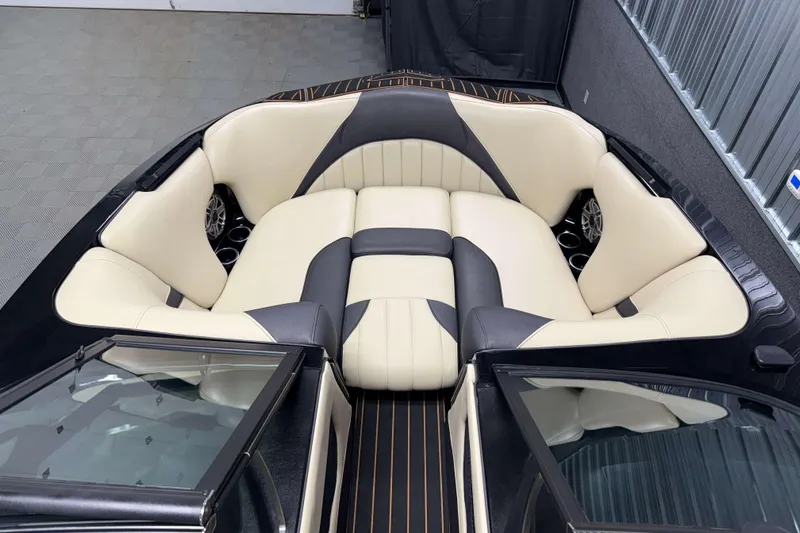 Slide: The Image of Luxurious interior of 2021 MB B52 23 Classic boat with cream and black seating. - 12