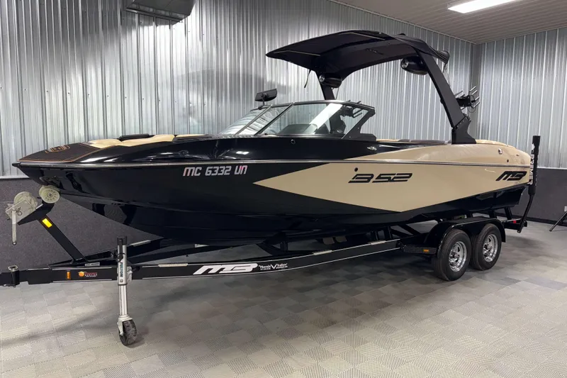 Slide: The Image of 2021 MB B52 23 Classic boat on trailer in indoor showroom. - 16