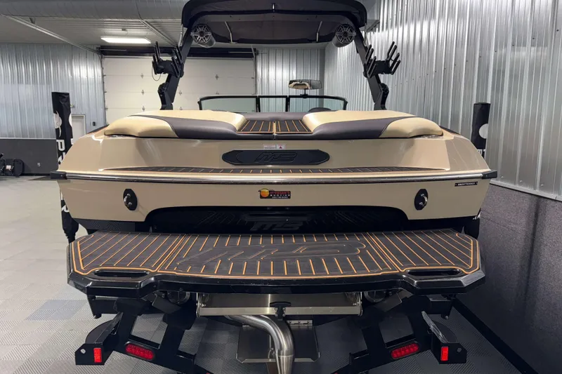 Slide: The Image of 2021 MB B52 23 Classic boat in a garage, showcasing sleek design and modern features. - 20