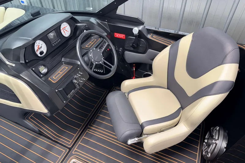 Slide: The Image of 2021 MB B52 23 Classic boat interior with modern dashboard and comfortable seating. - 8